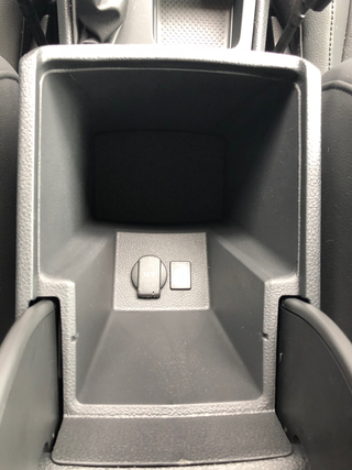 Hard to see here, but the center console bin does have felt at the bottom. The door pockets, however, do not have felt lining. The door pockets in the Golf do.